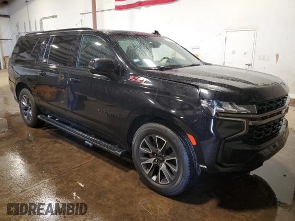 2022 Chevrolet Suburban Z71 with VIN 1GNSKDKDXNR198199, listed as a Copart auction lot 65367055 with 115,505 mi miles and Clean title. Bid and sale history available at DreamBid. Image 4.