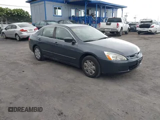 2004 Honda Accord LX with VIN JHMCM56304C037696, listed as a IAAI auction lot 42208122 with 163,905 mi miles and . Bid and sale history available at DreamBid. Image 1.