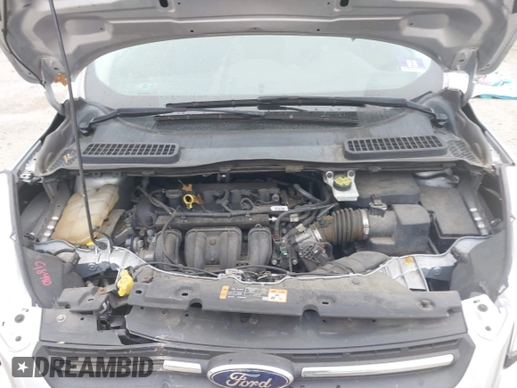 2015 Ford Escape SE z VIN 1FMCU0G73FUB10414, wystawiony jako IAAI lot #42173063 z przebiegiem 120 200 mil mil oraz . Historia ofert i sprzedaży dostępna na DreamBid. Obrazek 10.
