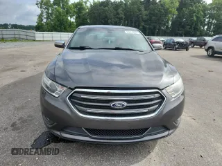 2016 Ford Taurus Limited z VIN 1FAHP2F87GG125043, wystawiony jako Copart lot #60412475 z przebiegiem 158 919 mil mil oraz Czysty tytuł • Clean title. Historia ofert i sprzedaży dostępna na DreamBid. Obrazek 5.