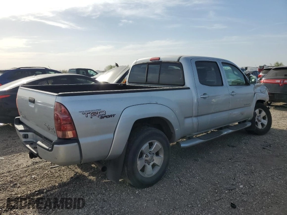 2005 Toyota Tacoma PreRunner with VIN 3TMKU72N65M003911, listed as a Copart auction lot 49546495 with 281,611 mi miles and Salvage title. Bid and sale history available at DreamBid. Image 3.