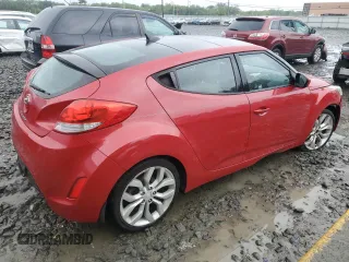 2013 Hyundai Veloster w/Gray Int z VIN KMHTC6AD0DU147454, wystawiony jako Copart lot #57814285 z przebiegiem 91 000 mil mil oraz Szkoda całkowita • Salvage title. Historia ofert i sprzedaży dostępna na DreamBid. Obrazek 3.