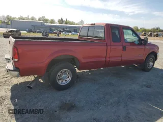 2002 Ford F-250 XL with VIN 1FTNX20F02EB64128, listed as a Copart auction lot 51979895 with 162,117 mi miles and Salvage title. Bid and sale history available at DreamBid. Image 3.