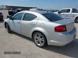 2012 Dodge Avenger SE with VIN 1C3CDZAB5CN259262, listed as a IAAI auction lot 42076157 with 146,310 mi miles. Bid and sale history available at carsss.com. Image 3.