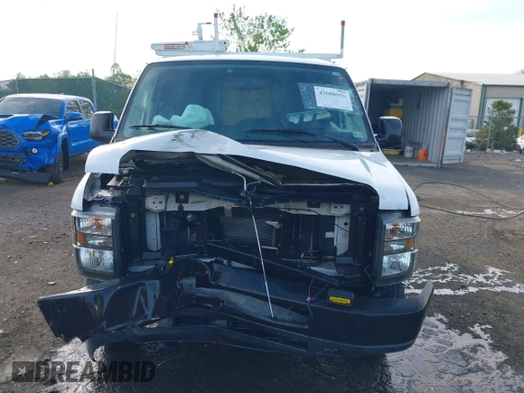 2011 Ford Econoline Cargo Commercial z VIN 1FTNE2EL6BDB35128, wystawiony jako IAAI lot #42088056 z przebiegiem 146 609 mil mil oraz . Historia ofert i sprzedaży dostępna na DreamBid. Obrazek 12.