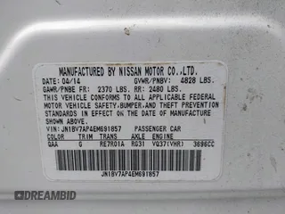 2014 Infiniti Q50 Premium with VIN JN1BV7AP4EM691857, listed as a IAAI auction lot 42372219 with 177,021 mi miles and . Bid and sale history available at DreamBid. Image 9.