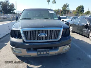 2004 Ford F-150 XL with VIN 1FTPX125X4NB03038, listed as a IAAI auction lot 41555454 with 218,770 mi miles. Bid and sale history available at carsss.com. Image 6.