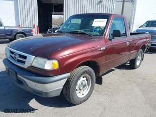 2003 Mazda B-Series 2WD Truck SX with VIN 4F4YR12D03TM09575, listed as a IAAI auction lot 41693387 with 173,882 mi miles. Bid and sale history available at carsss.com. Image 2.