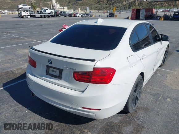 2014 BMW 3 Series 328d with VIN WBA3D3C5XEK156288, listed as a IAAI auction lot 42301663 with 84,416 mi miles and . Bid and sale history available at DreamBid. Image 4.