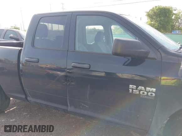 2019 Ram 1500 Tradesman with VIN 1C6RR6FG7KS613350, listed as a IAAI auction lot 42066912 with 115,660 mi miles and . Bid and sale history available at DreamBid. Image 13.