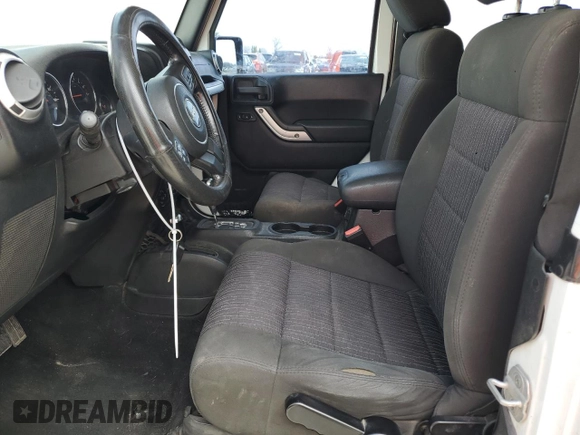 2012 Jeep Wrangler Arctic with VIN 1C4AJWBG1CL154184, listed as a Copart auction lot 50865135 with 152,767 mi miles and Clean title. Bid and sale history available at DreamBid. Image 7.