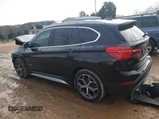 2018 BMW X1 sDrive28i with VIN WBXHU7C30J5H42110, listed as a Copart auction lot 70757602 with 50,516 mi miles. Bid and sale history available at carsss.com. Image 2.