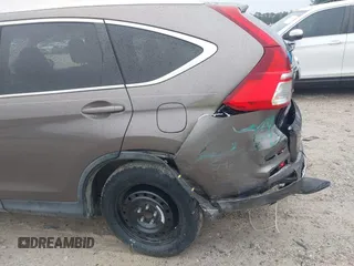 2015 Honda CR-V Touring z VIN 5J6RM3H99FL002315, wystawiony jako IAAI lot #42364421 z przebiegiem 94 018 mil mil oraz . Historia ofert i sprzedaży dostępna na DreamBid. Obrazek 18.