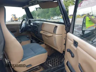 2001 Jeep Wrangler Sahara with VIN 1J4FA59S41P358035, listed as a IAAI auction lot 42685488 with 120,630 mi miles and . Bid and sale history available at DreamBid. Image 5.