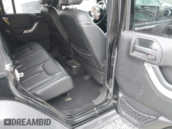 2015 Jeep Wrangler Unlimited Rubicon Hard Rock with VIN 1C4HJWFG6FL757421, listed as a IAAI auction lot 42107514 with 63,997 mi miles and . Bid and sale history available at DreamBid. Image 8.