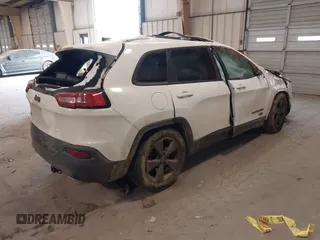 2016 Jeep Cherokee Latitude with VIN 1C4PJMCS1GW314036, listed as a IAAI auction lot 41303805 with 121,551 mi miles. Bid and sale history available at carsss.com. Image 4.