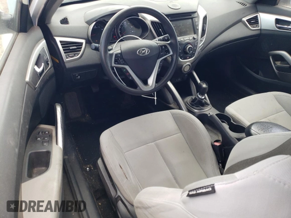 2013 Hyundai Veloster w/Black Int z VIN KMHTC6AD3DU085015, wystawiony jako Copart lot #54473595 z przebiegiem 158 966 mil mil oraz Szkoda całkowita • Salvage title. Historia ofert i sprzedaży dostępna na DreamBid. Obrazek 8.