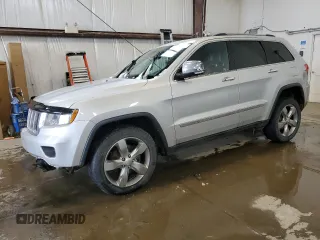 2013 Jeep Grand Cherokee Overland with VIN 1C4RJFCG2DC622345, listed as a Copart auction lot 49640325 with 192,144 mi miles and Salvage Title. Bid and sale history available at carsss.com. Image 1.
