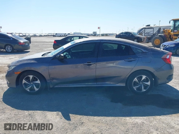 2019 Honda Civic Sedan LX with VIN 19XFC2F64KE005270, listed as a IAAI auction lot 41852238 with 106,604 mi miles. Bid and sale history available at carsss.com. Image 14.