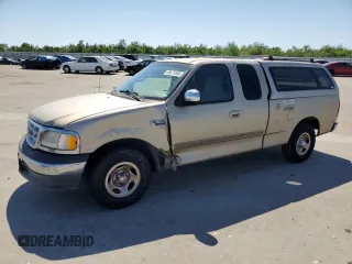 1999 Ford F-150 z VIN 1FTRX17W1XKB34923, wystawiony jako Copart lot #56675855 z przebiegiem 95 757 mil mil oraz Szkoda całkowita • Salvage title. Historia ofert i sprzedaży dostępna na DreamBid. Obrazek 1.