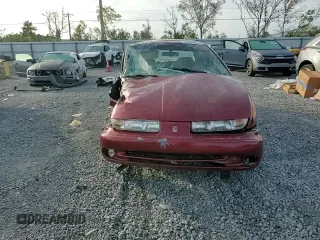 1999 Saturn SL z VIN 1G8ZK5278XZ173810, wystawiony jako Copart lot #42571425 z przebiegiem 114 580 mil mil oraz Szkoda całkowita • Salvage title. Historia ofert i sprzedaży dostępna na DreamBid. Obrazek 10.