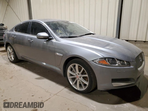 2015 Jaguar XF with VIN SAJXJ0EF1F8U48283, listed as a Copart auction lot 81004054 with 77,828 mi miles and Clean Title. Bid and sale history available at DreamBid. Image 4.