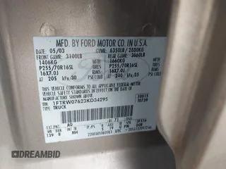 2003 Ford F-150 XLT with VIN 1FTRW07623KD34295, listed as a IAAI auction lot 41515387 with 163,506 mi miles. Bid and sale history available at carsss.com. Image 9.
