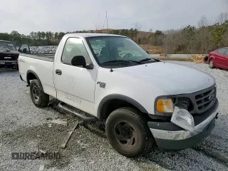 2003 Ford F-150 XL z VIN 1FTRF18W53NB45997, wystawiony jako Copart lot #42451525 z przebiegiem 149 166 mil mil oraz Szkoda całkowita • Salvage title. Historia ofert i sprzedaży dostępna na DreamBid. Obrazek 11.
