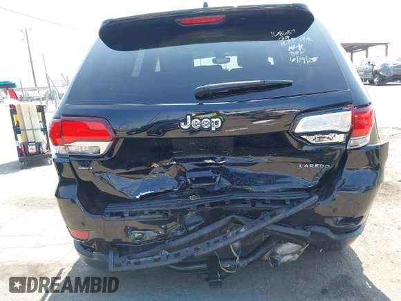 2022 Jeep Grand Cherokee Laredo X with VIN 1C4RJEAG7NC171377, listed as a IAAI auction lot 42592264 with 69,074 mi miles and . Bid and sale history available at DreamBid. Image 6.