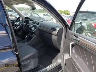 2024 Volkswagen Tiguan with VIN 3VVTB7AX9RM218526, listed as a IAAI auction lot 42564195 with Not provided miles and . Bid and sale history available at DreamBid. Image 5.