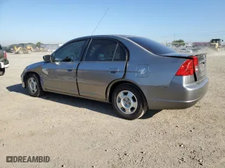 2004 Honda Civic Hybrid with VIN JHMES95604S017164, listed as a Copart auction lot 52166675 with 304,276 mi miles and Salvage Title. Bid and sale history available at carsss.com. Image 2.