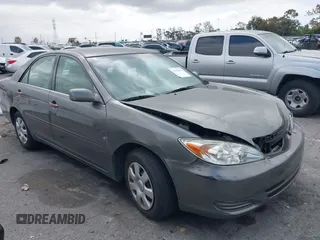 2004 Toyota Camry LE z VIN 4T1BE32K74U811170, wystawiony jako IAAI lot #42194129 z przebiegiem 92 197 mil mil oraz . Historia ofert i sprzedaży dostępna na DreamBid. Obrazek 1.