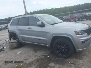 2018 Jeep Grand Cherokee Laredo E z VIN 1C4RJEAG5JC404022, wystawiony jako IAAI lot #42586412 z przebiegiem 95 798 mil mil oraz . Historia ofert i sprzedaży dostępna na DreamBid. Obrazek 13.