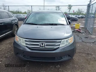 2012 Honda Odyssey EX-L with VIN 5FNRL5H64CB028040, listed as a IAAI auction lot 42126048 with 160,675 mi miles and . Bid and sale history available at DreamBid. Image 12.
