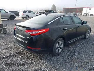 2012 Kia Optima Hybrid with VIN KNAGM4AD7C5010458, listed as a IAAI auction lot 42165589 with 215,018 mi miles. Bid and sale history available at carsss.com. Image 4.