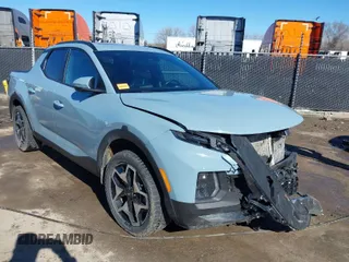 2022 Hyundai Santa Cruz Limited z VIN 5NTJEDAF1NH036226, wystawiony jako IAAI lot #38829772 z przebiegiem 59 265 mil mil oraz . Historia ofert i sprzedaży dostępna na DreamBid. Obrazek 1.