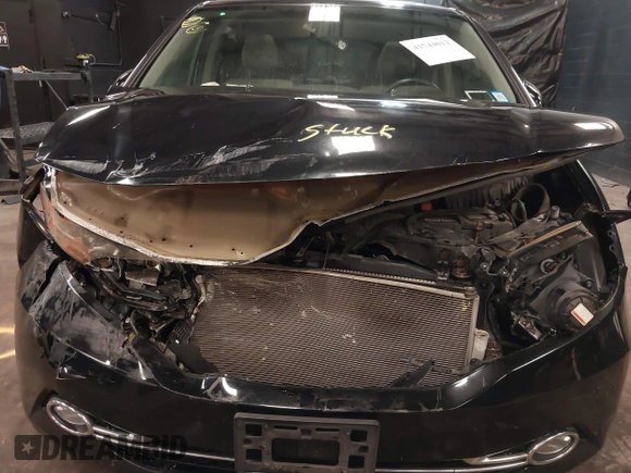 2014 Honda Odyssey Touring with VIN 5FNRL5H94EB105745, listed as a IAAI auction lot 41744012 with 77,032 mi miles and . Bid and sale history available at DreamBid. Image 6.