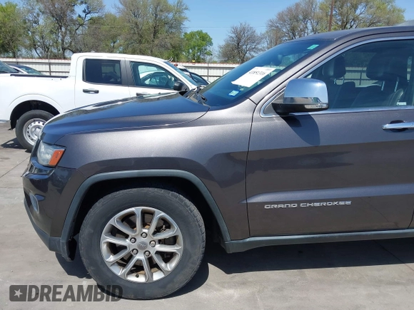 2014 Jeep Grand Cherokee Limited z VIN 1C4RJFBT0EC241030, wystawiony jako IAAI lot #41851316 z przebiegiem 104 344 mil mil oraz . Historia ofert i sprzedaży dostępna na DreamBid. Obrazek 19.