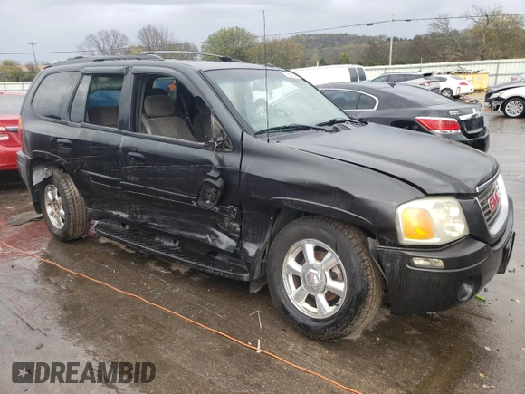 2004 GMC Envoy SLT with VIN 1GKDT13S042310076, listed as a Copart auction lot 79965854 with 220,506 mi miles and Salvage Title. Bid and sale history available at carsss.com. Image 4.