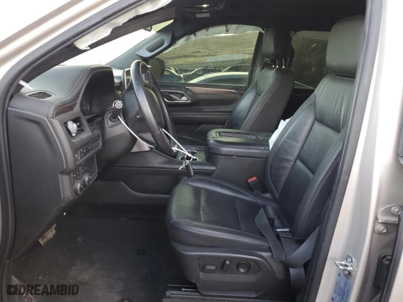 2021 Chevrolet Suburban Z71 with VIN 1GNSKDKD8MR462700, listed as a Copart auction lot 77406654 with 54,864 mi miles and Salvage Title. Bid and sale history available at carsss.com. Image 7.