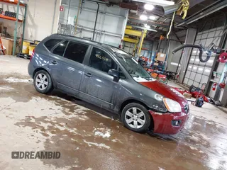 2008 Kia Rondo EX with VIN KNAFG526087146239, listed as a IAAI auction lot 41325241 with 200,666 mi miles. Bid and sale history available at carsss.com. Image 1.