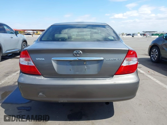 2004 Toyota Camry LE with VIN 4T1BE32K44U825561, listed as a IAAI auction lot 42051914 with 244,521 mi miles and . Bid and sale history available at DreamBid. Image 15.