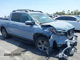2022 Honda Ridgeline RTL-E z VIN 5FPYK3F76NB019199, wystawiony jako IAAI lot #42327582 z przebiegiem Nie podano mil oraz . Historia ofert i sprzedaży dostępna na DreamBid. Obrazek 1.