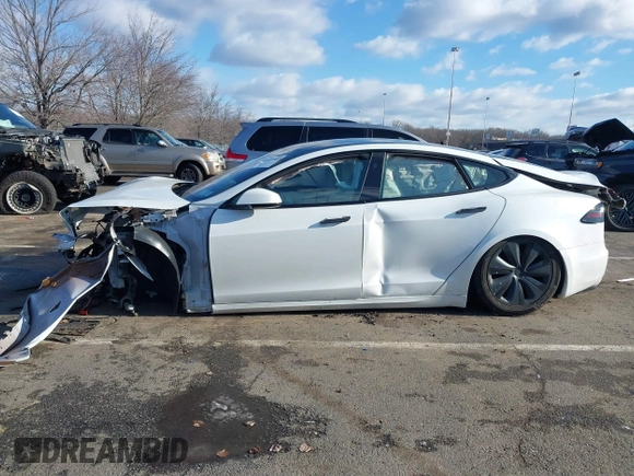 2022 Tesla Model S with VIN 5YJSA1E51NF491493, listed as a IAAI auction lot 41570494 with Not Provided miles and . Bid and sale history available at DreamBid. Image 14.