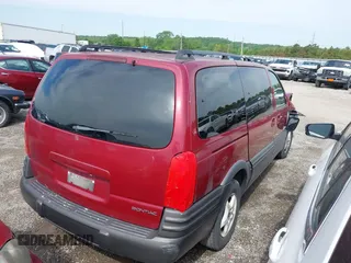 2004 Pontiac Montana 1SA with VIN 1GMDX03E94D111094, listed as a IAAI auction lot 41988723 with Not Provided miles and . Bid and sale history available at DreamBid. Image 4.