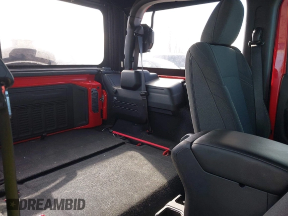 2024 Jeep Wrangler Sport S with VIN 1C4PJXAG7RW304498, listed as a IAAI auction lot 41962812 with 9,457 mi miles and . Bid and sale history available at DreamBid. Image 8.