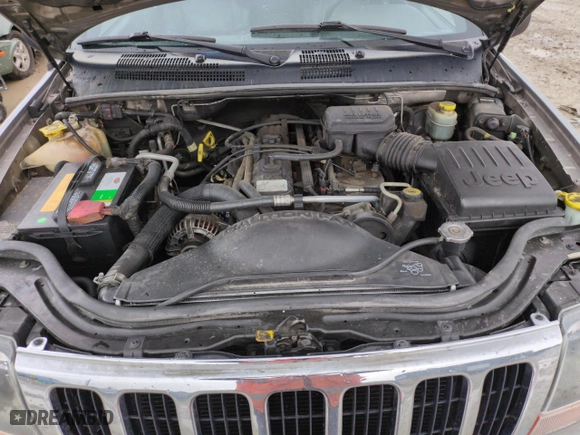 1999 Jeep Grand Cherokee Laredo with VIN 1J4GW58SXXC553547, listed as a Copart auction lot 50786405 with 151,968 mi miles and Salvage Title. Bid and sale history available at carsss.com. Image 11.