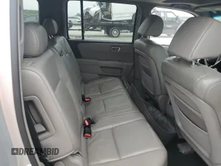 2009 Honda Pilot EX-L z VIN 5FNYF38589B003844, wystawiony jako Copart lot #55956985 z przebiegiem 216 457 mil mil oraz Szkoda całkowita • Salvage title. Historia ofert i sprzedaży dostępna na DreamBid. Obrazek 11.