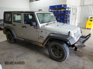 2009 Jeep Wrangler Unlimited X with VIN 1J4GZ39159L711944, listed as a Copart auction lot 50406045 with 211,099 mi miles and Clean Title. Bid and sale history available at carsss.com. Image 4.