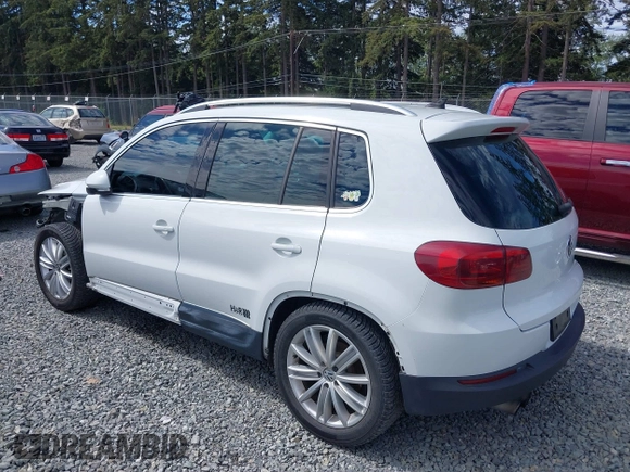 2016 Volkswagen Tiguan S with VIN WVGBV7AXXGW580052, listed as a IAAI auction lot 41444015 with 102,165 mi miles and . Bid and sale history available at DreamBid. Image 3.